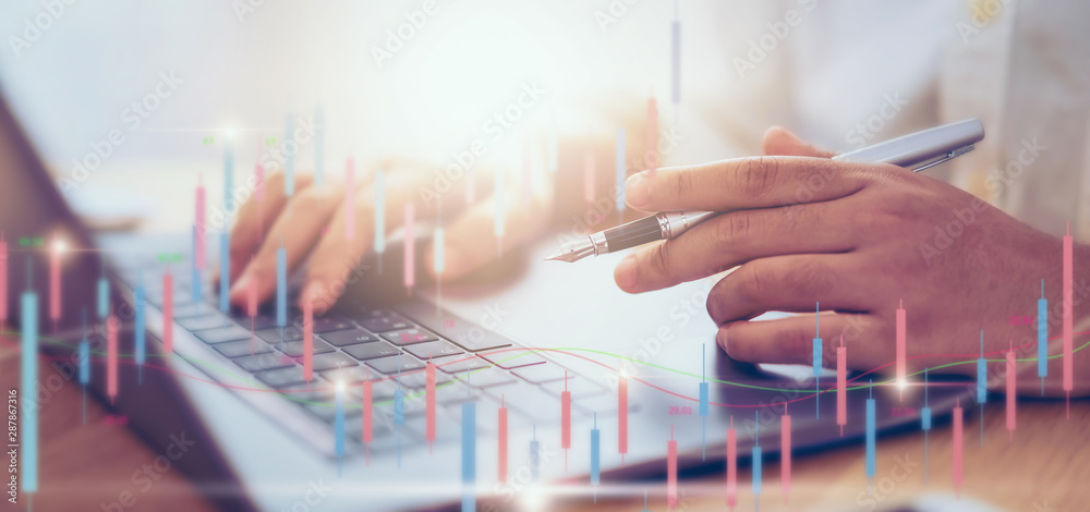Stock exchange market concept, businessman trader working on computer laptop with graphs analysis candle line in office room. Stock exchange market concept, businessman trader working on computer laptop with graphs analysis candle line in office room.