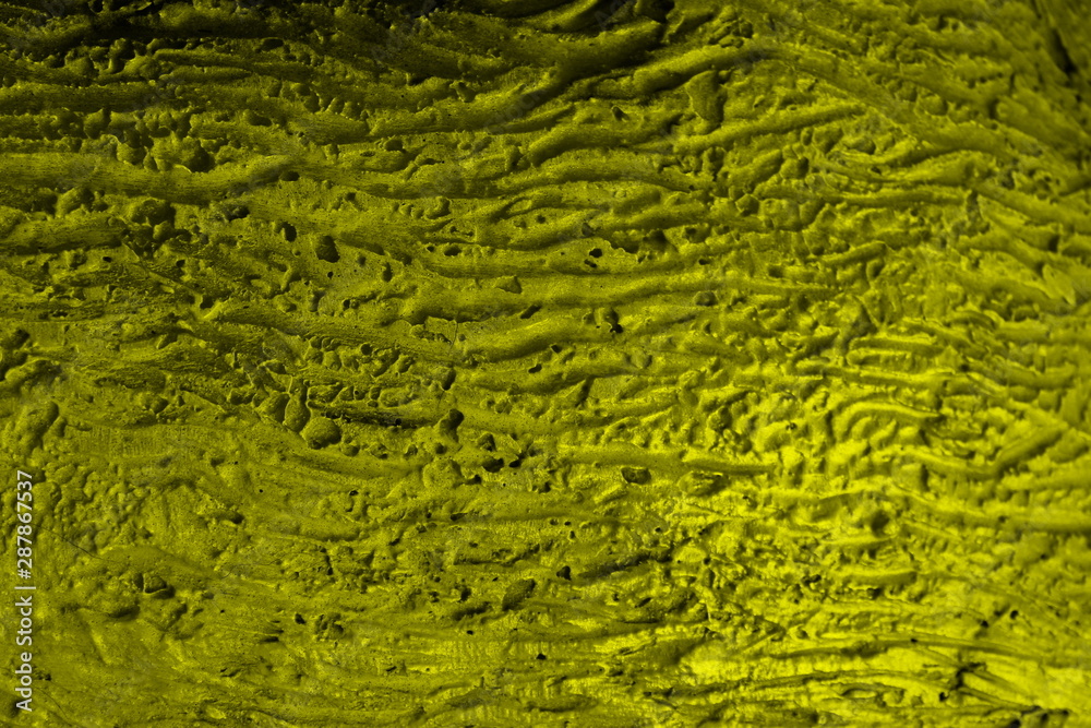 uneven texture surface with small yellow dimples uneven texture surface with small yellow dimples