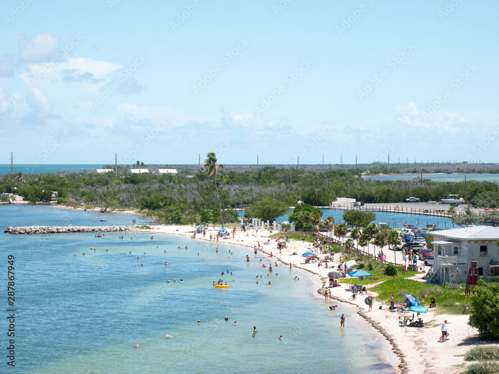 Calusa Beach, Florida Keys, Florida, USA. Bahia Honda State Park. Peopke enjoying the beautiful beach in a hot summer day