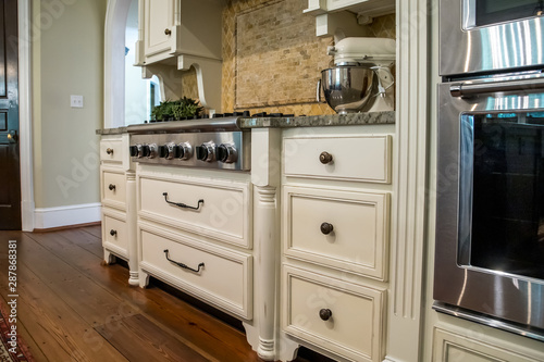 Canvas Print kitchen with hardwood floors and custom cabinets