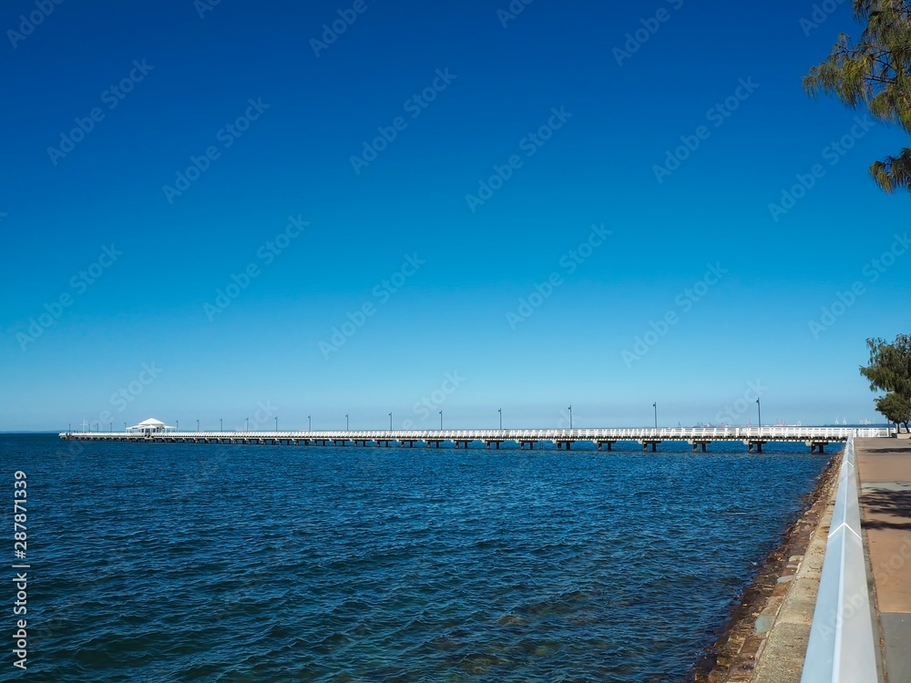 Beautiful view of Shorncliffe Pier from Moora Park, Shorncliffe in Brisbane, Australia.