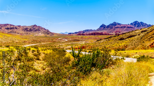 Northshore Road SR167 in Lake Mead National Recreation Area winding through semi desert landscape with colorful mountains between Boulder City and Overton in Nevada, USA photo