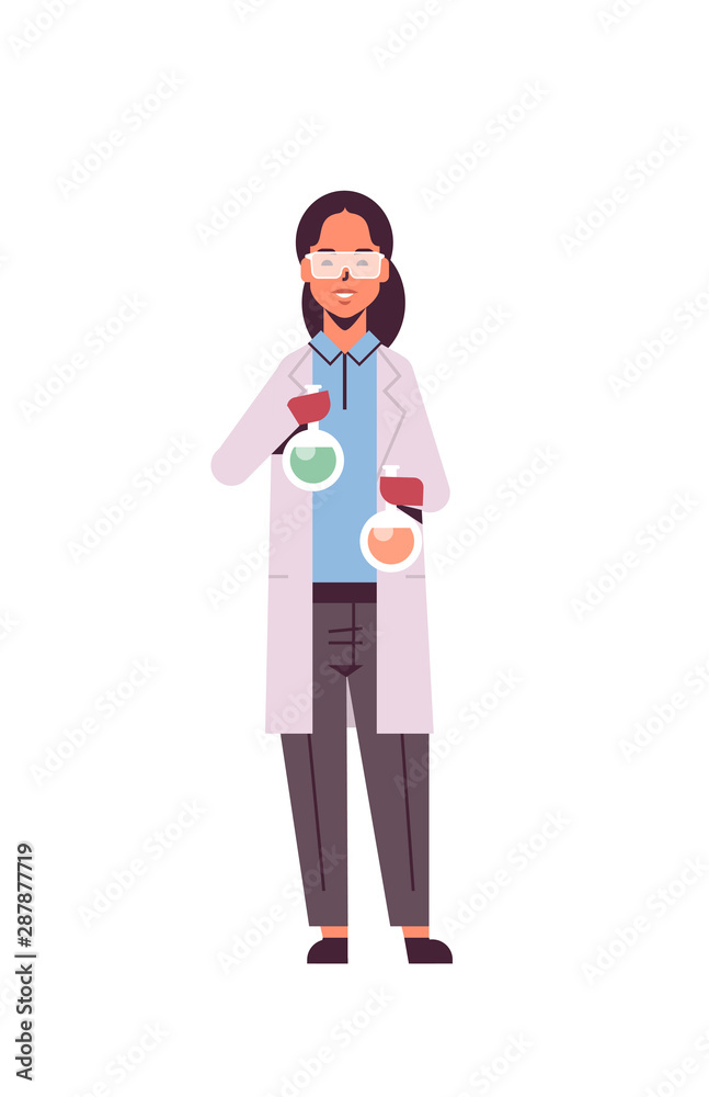 female scientist holding test tubes with colorful liquid woman in uniform and protective gloves holding flasks making experiment in laboratory research science chemical concept vertical full length female scientist holding test tubes with colorful liquid woman in uniform and protective gloves holding flasks making experiment in laboratory research science chemical concept vertical full length