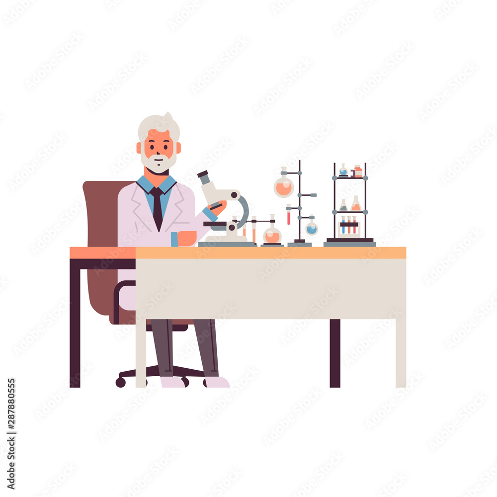 senior male scientist working with microscope man in uniform sitting at table making scientific experiments in chemistry laboratory with test tubes research science concept full length