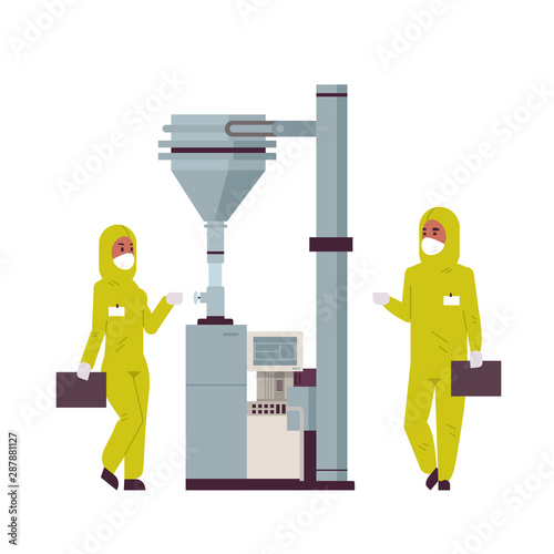 scientists couple working with control panel pressing start button on special machine african american man woman in protective suits pharmaceutical items production concept full length