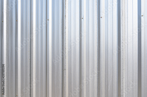 Silver steel metal sheet pattern background.