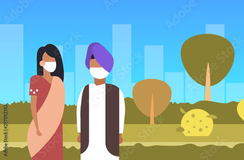 arab couple wearing face mask dirty waste toxic air pollution industry smog polluted environment concept arabic man woman walking outdoor cityscape background portrait horizontal