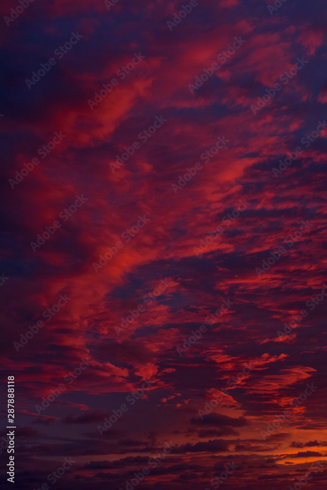 Evening blue and red sky with clouds after the sunset