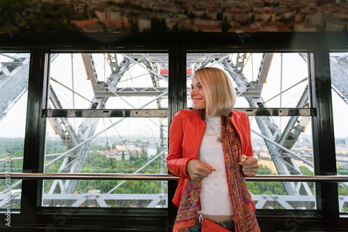 A woman rides on a ferris wheel in Vienna, Austria.