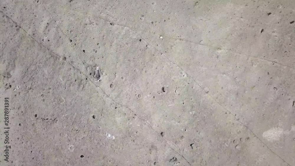 Drone aerial shot, landing on a moon like landscape.The shot is turning up to the end of the landing. Drone aerial shot, landing on a moon like landscape.The shot is turning up to the end of the landing.