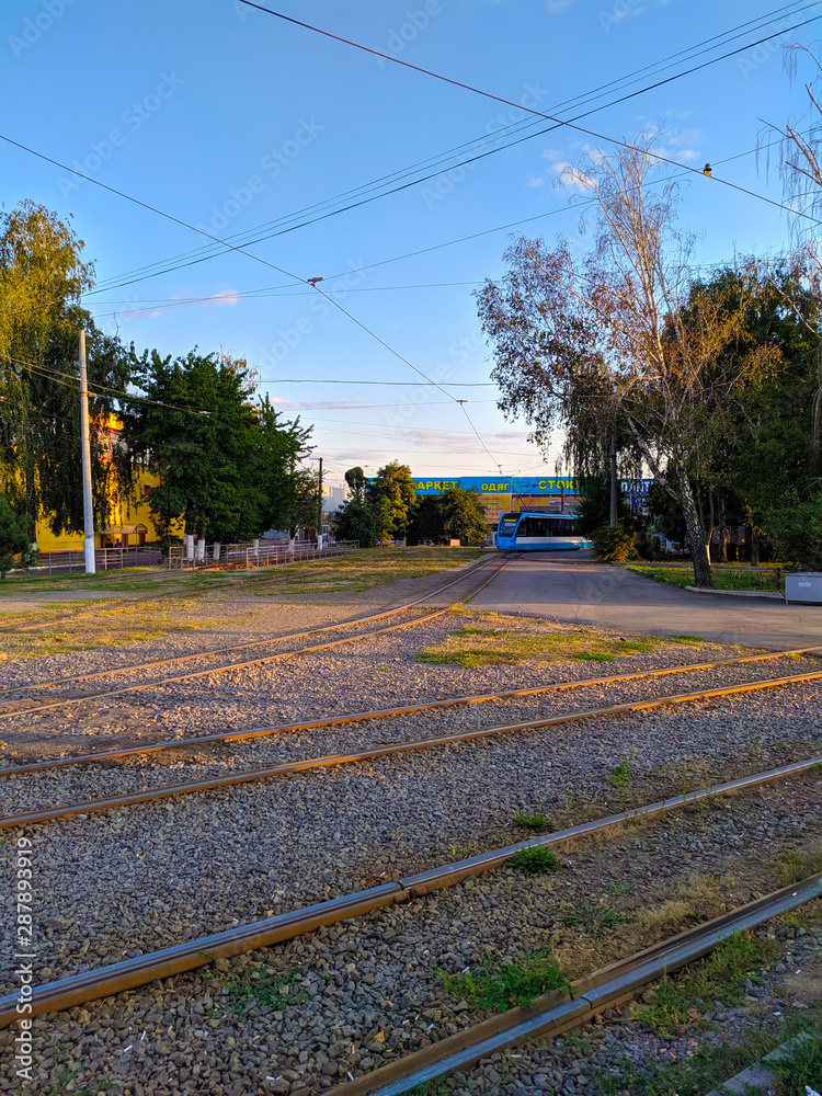 Naklejka premium Delicate sky and tram tracks