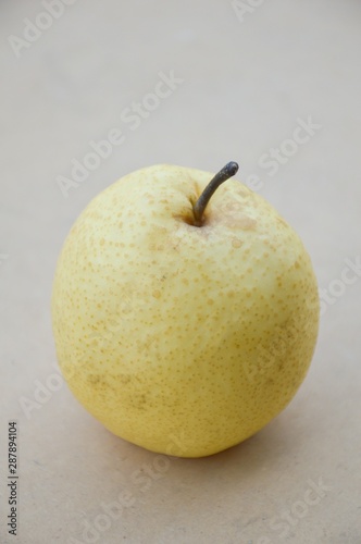 close up chinese pear fruit on wood floor