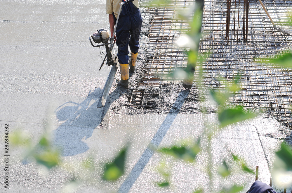 Naklejka premium Concrete pouring during commercial concreting floors of buildings in construction