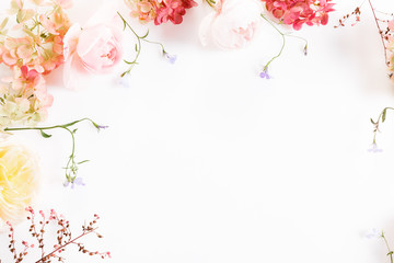Festive flower composition on the white background. Overhead view