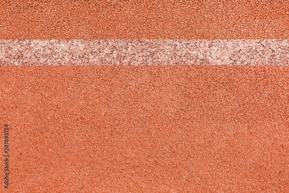 Fototapeta premium Surface of rubber pellets in treadmill athletics field texture background