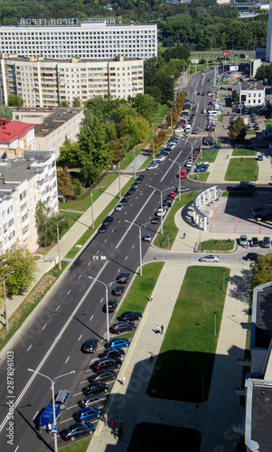 Top view of the road with cars in the city.