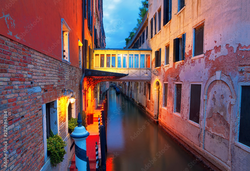 beautiful illumination of water canal in Venice
