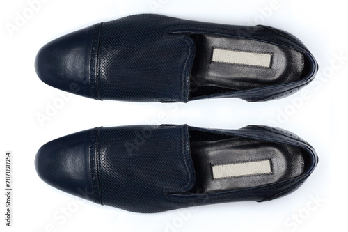 Classic male leather shoes isolated on a white, top view.