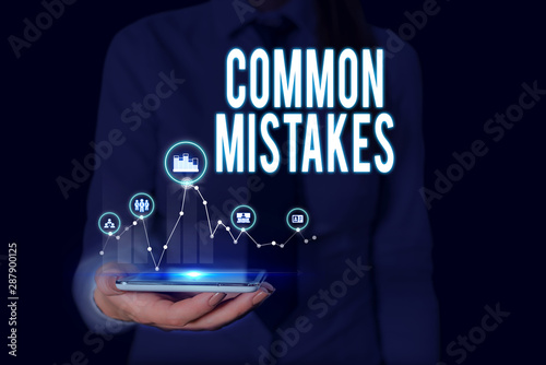 Text sign showing Common Mistakes. Business photo text actions that are often used interchangeably with error Woman wear formal work suit presenting presentation using smart device