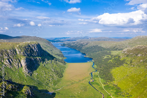 Aerial view of the Glenveagh National Park with castle Castle and Loch in the background - County Donegal, Ireland photo