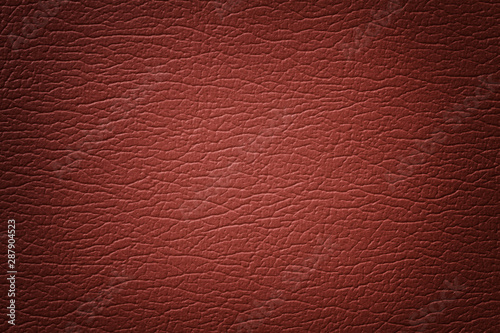 Photos Orange leather texture background with pattern, closeup.