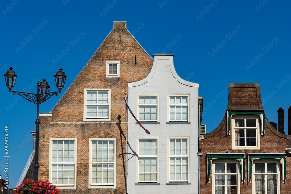 Fototapeta premium facade of houses on main square Markt in Delft, The Netherlands