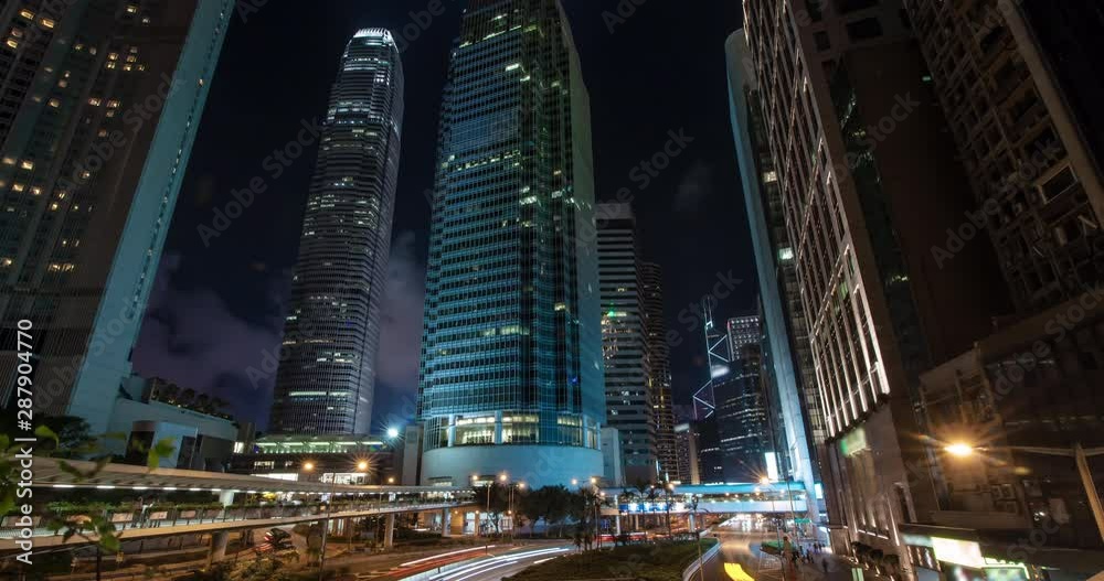 Busy traffic across the main road at rush hour Hong Kong street traffic at night modern urban cityscape downtown time lapse Busy traffic across the main road at rush hour Hong Kong street traffic at night modern urban cityscape downtown time lapse