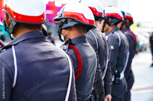 Thai Polices wear the helmet, stand in the row.