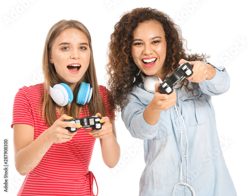 Teenage girls playing video...