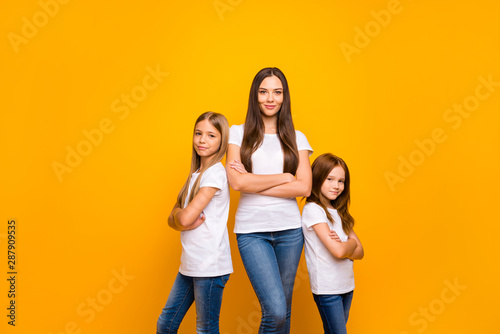 Photo of three sister ladies self-confident crossing arms wear casual outfit isolated yellow background