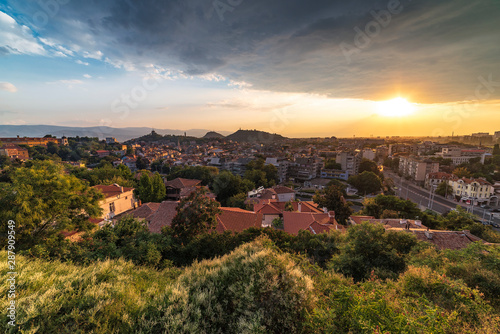 Summer sunset cityscape from Nebet tepe Hill in Plovdiv city, Bulgaria. Panoramic view. Ancient Plovdiv is UNESCO's World Heritage. © Petar