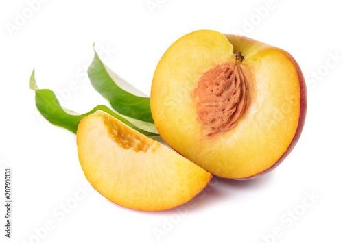 Ripe cut peach on white background