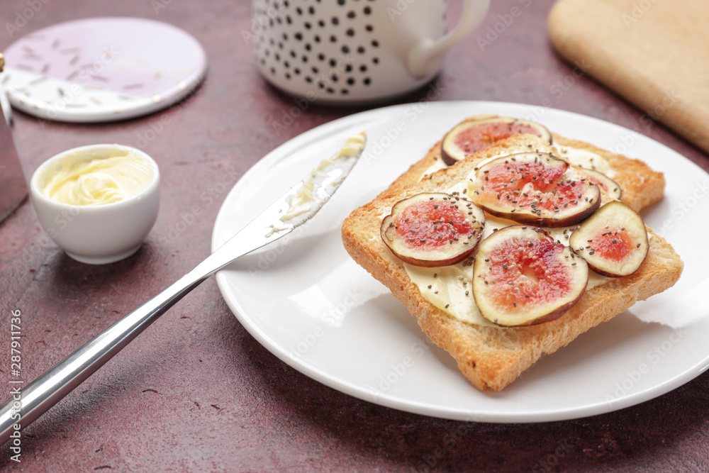 Plate with tasty sandwiches on table