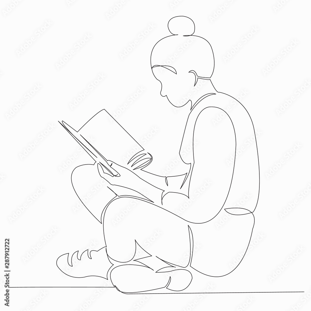 girl reads a book in the library girl reads a book in the library
