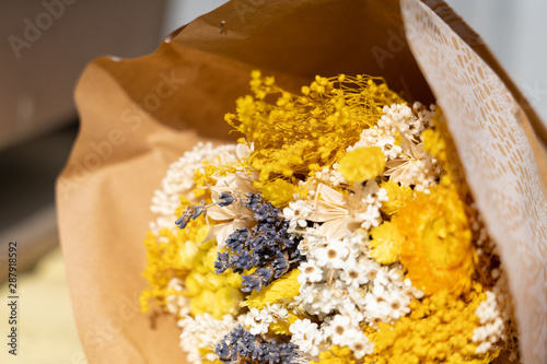 dried bouquet of flowers under the sun