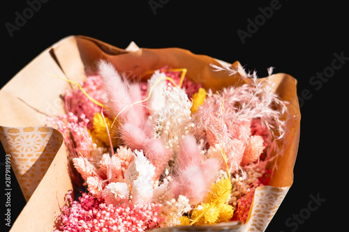 bouquet of pink and yellow dried flowers