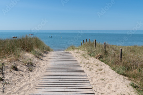 wooden walkway leading to Noirmoutier beach in Vend  e France