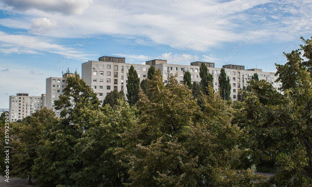 Concrete block of flats and cloudy sky in the Gazdagrét neighbourhood of Budapest, Hungary, Europe. Residential area consisting of prefabricated buildings in the western part of the 11th district.