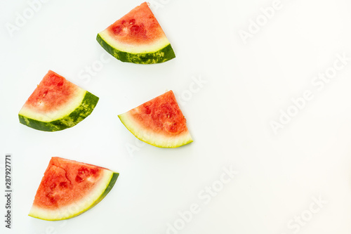 Summer background with watermelon slices and copy space on right side.