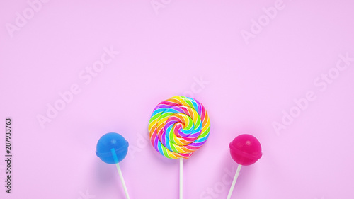Beautiful color lollipop on pink background