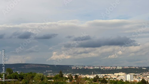 Time lapse footage of summer sunset over european cityscape. Sunset footage of Brno, Czech Republic. photo