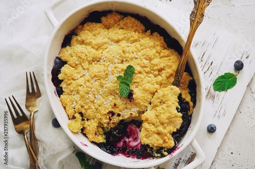 Картината върху платно Homemade Blueberry cornmeal Cobbler baked in a Ramekin