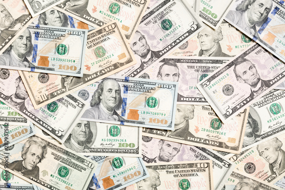 Top view of various dollar cash background. Different banknotes concept. Wealth and rich concept Top view of various dollar cash background. Different banknotes concept. Wealth and rich concept