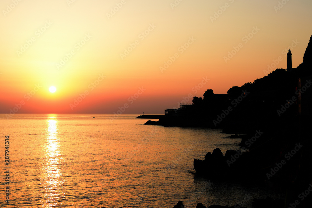 Beautiful sunrise over the sea near the city of Cefalu. Sicily, Italy