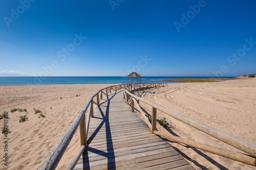 long curve wooden footpath structure of Beach Varadero and Marisucia  in Canos Meca village  Barbate  Cadiz  Andalusia  Spain 