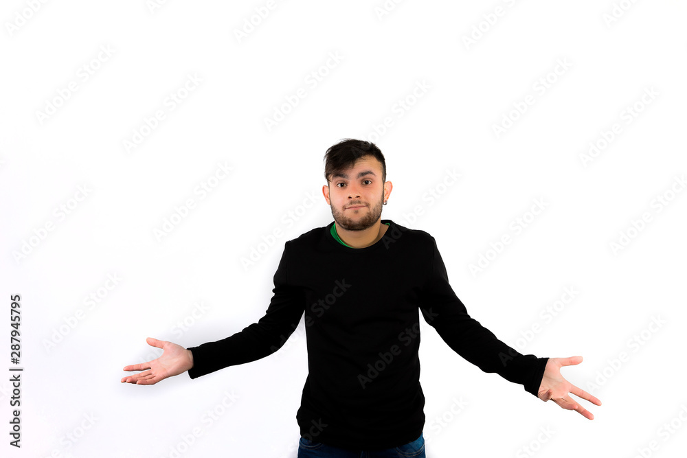 Young bearded confused man with a confused expresion Young bearded confused man with a confused expresion