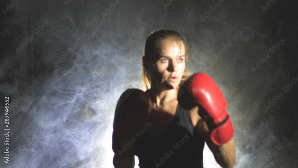 3 in 1 !. Adult woman boxer fight does blows in smoke, self-defense team 3 in 1 !. Adult woman boxer fight does blows in smoke, self-defense team