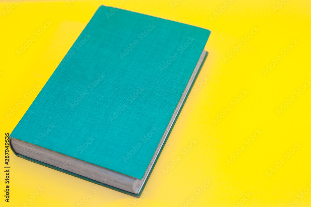 Fototapeta premium Vibrant Vintage Book on Bright Background With Copy Space