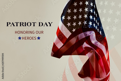 text patriot day honoring our heroes. photo