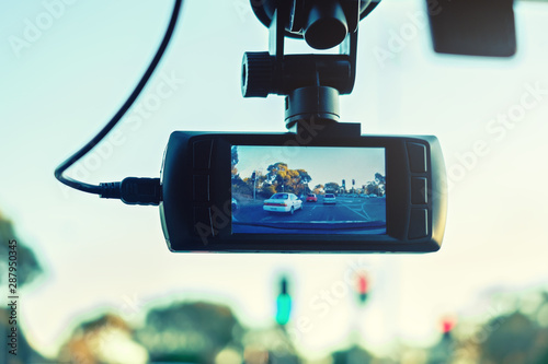 Car dashboard camera recording traffic in action photo